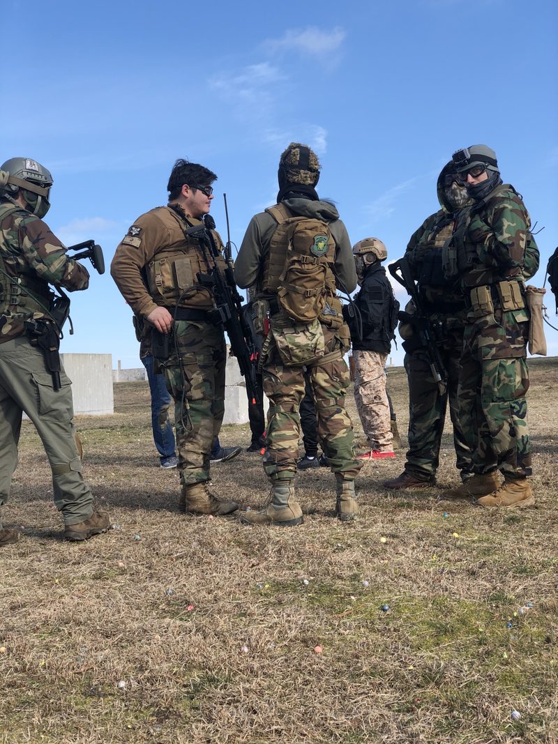 A large-scale airsoft scenario game in progress at Cousins Adventure Parks