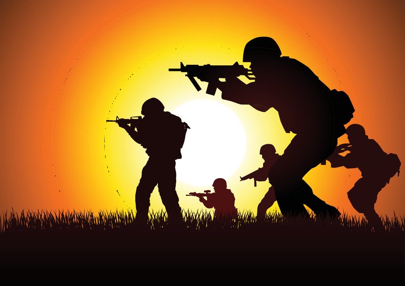 Players taking cover during an airsoft game at Cousins Adventure Parks