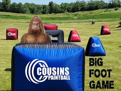 A large-scale paintball scenario game in progress at Cousins Adventure Parks