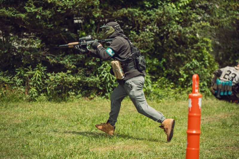 Players taking cover during a paintball game at Cousins Adventure Parks