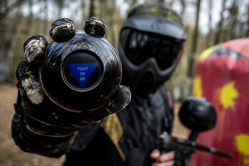 Players taking cover during a paintball game at Cousins Adventure Parks